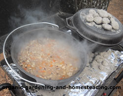 Cooking in a cast iron Dutch oven.