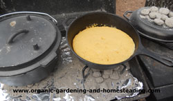 Baking cornbread in a cast iron Dutch oven.